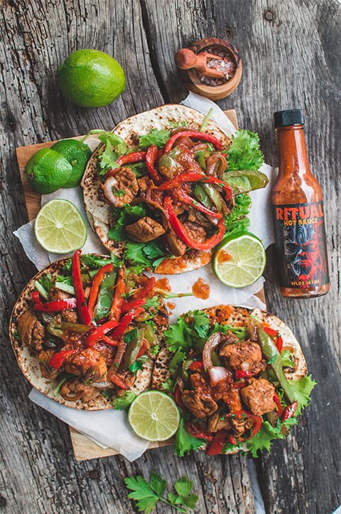 fiery chicken tacos with hot sauce