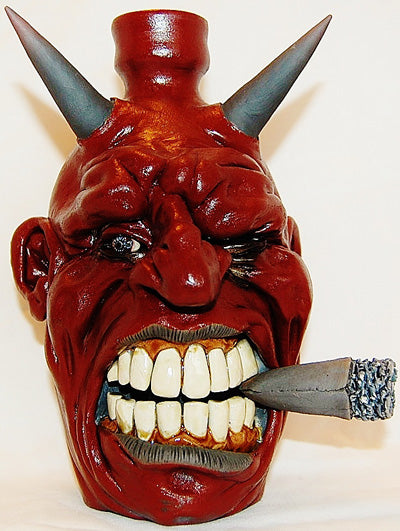 demon head hot sauce bottle