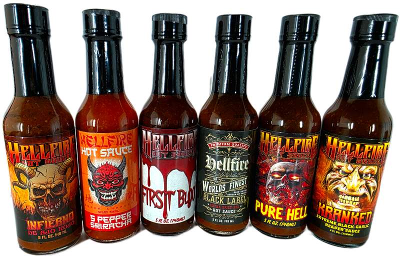 Seven bottles of Hellfire hot sauce with various labels on a white background